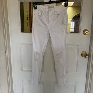 New with tags Free People white distressed skinny jeans.
